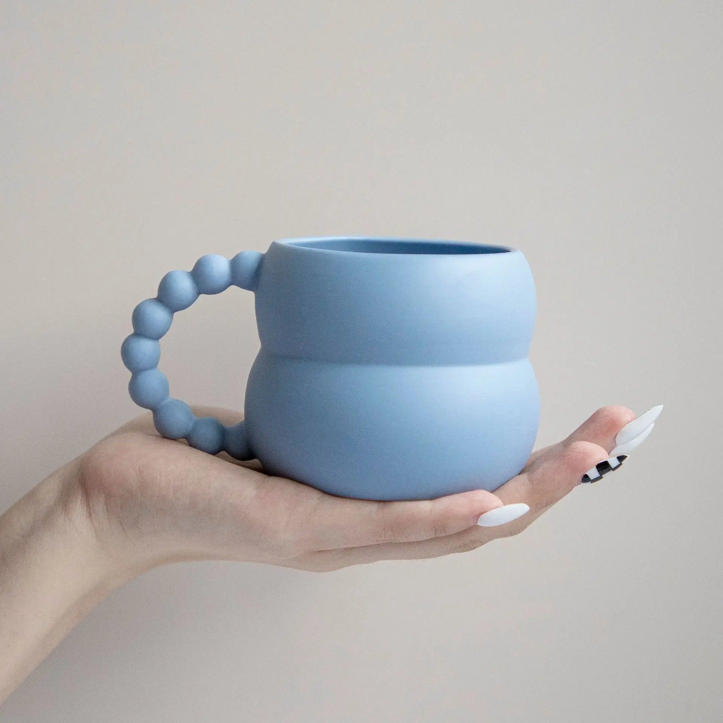 Handcrafted Ceramic Mug: A Touch of Whimsy for Your Morning